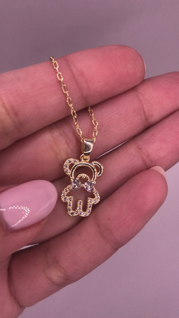 This gorgeous 14K Gold Plated Teddy Bear Necklace sparkles and adds a cute flair for any occasion. 